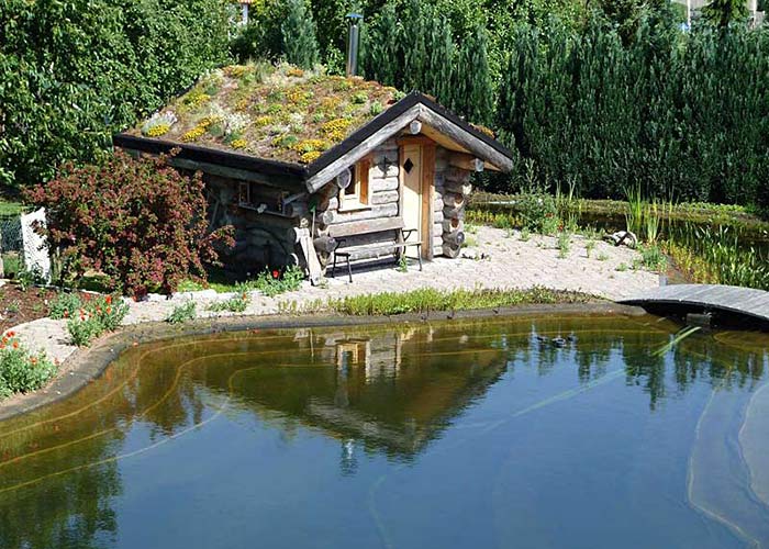 Kelo Massivholzsauna am Teich